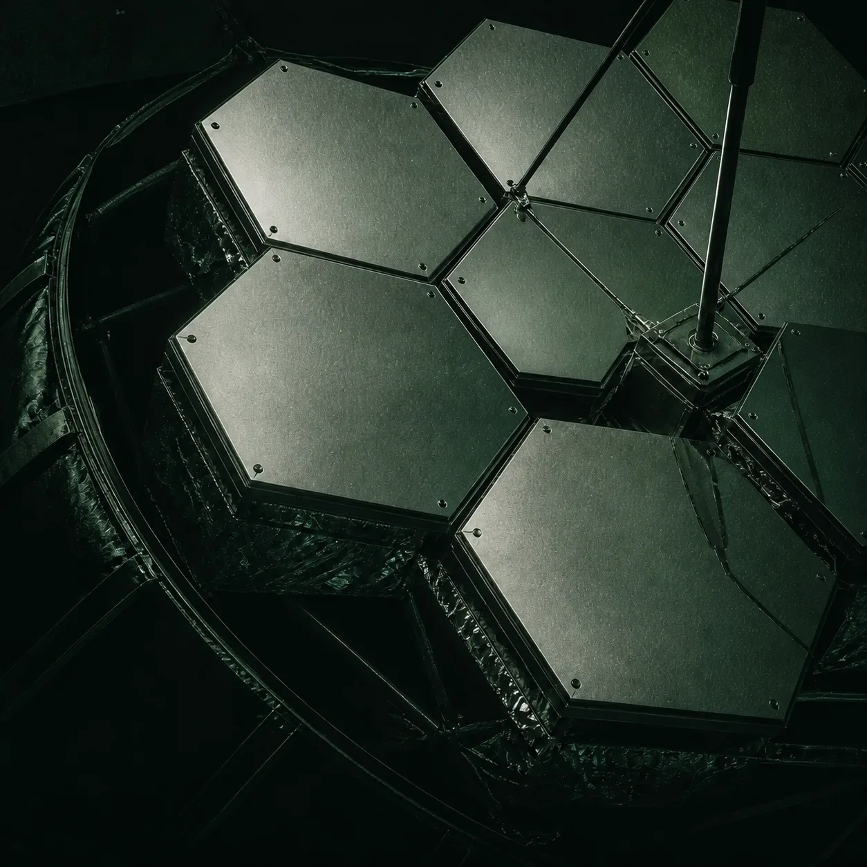 Segmented telescope mirrors represent the specialised components assembled to provide AI inference.