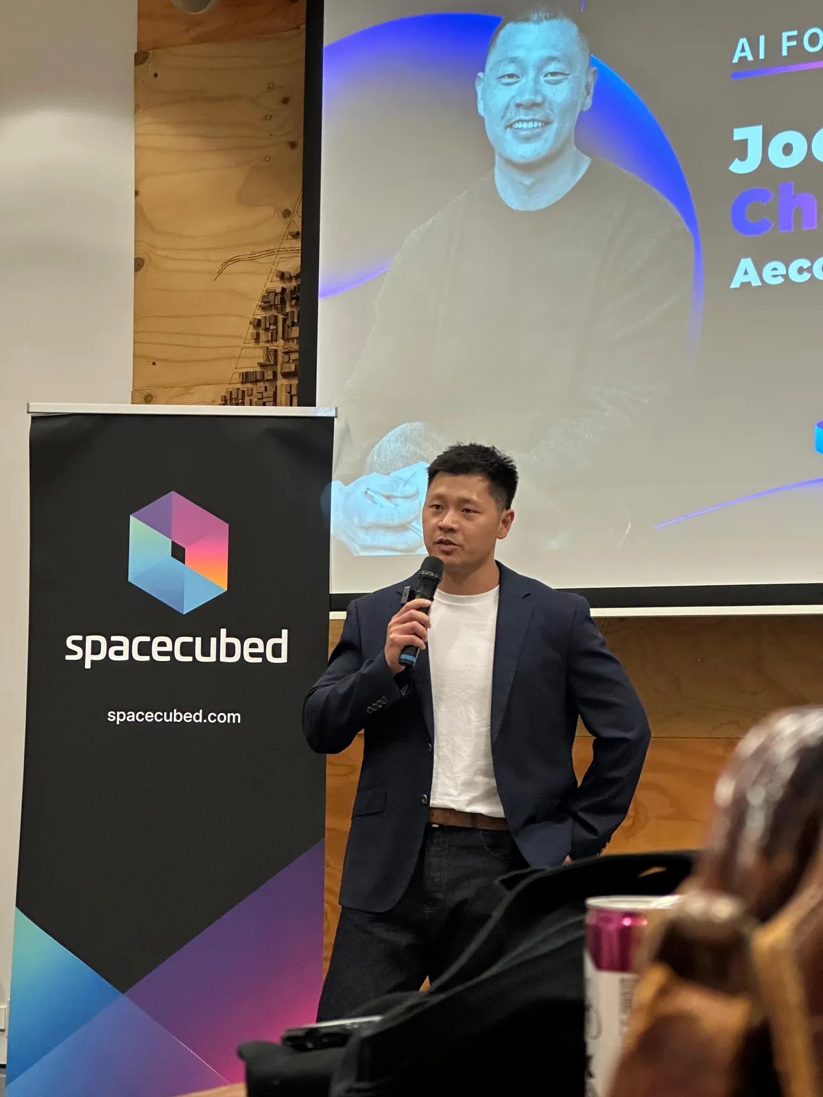 Joel Chan presenting Aecon at Spacecubed’s AI Founder Sprint Demo Night in Perth.